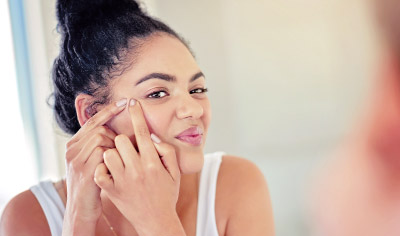 Why Pimples Pop Up in the Same Spot
